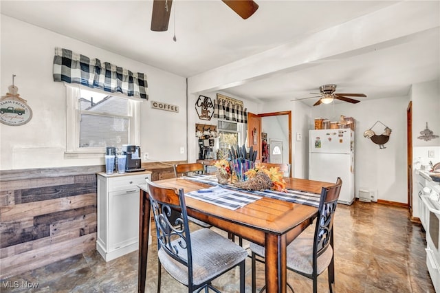 dining space with ceiling fan