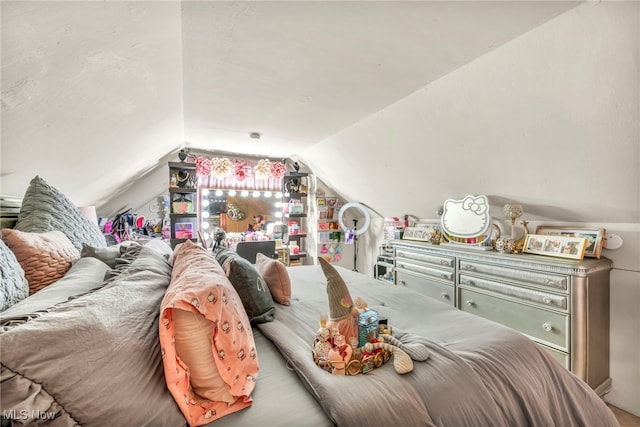 bedroom featuring vaulted ceiling