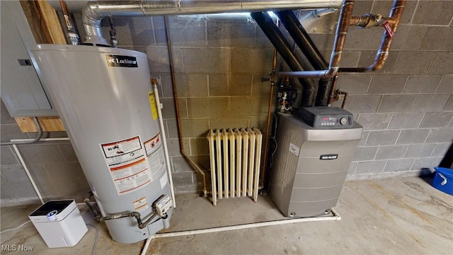 utility room with radiator and gas water heater