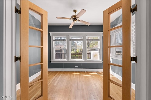 unfurnished sunroom featuring a wealth of natural light