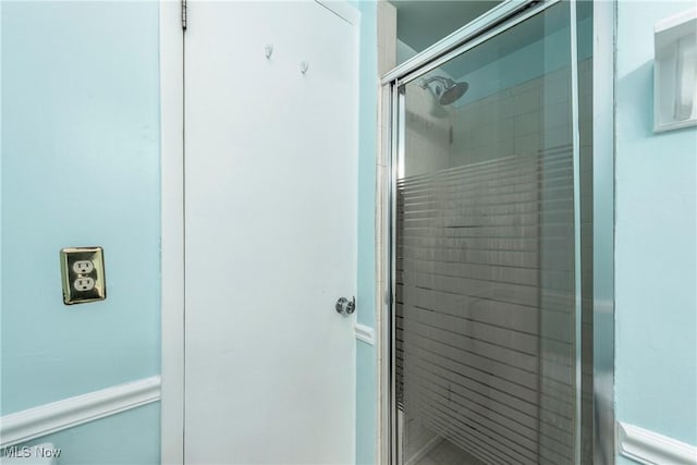 bathroom featuring a shower stall