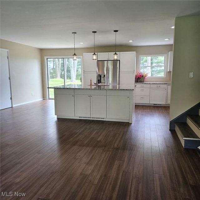 2939 Lindale Dr, Akron, OH 44312 - kitchen with stainless steel fridge with ice dispenser, white cabinetry, and dark wood-type flooring