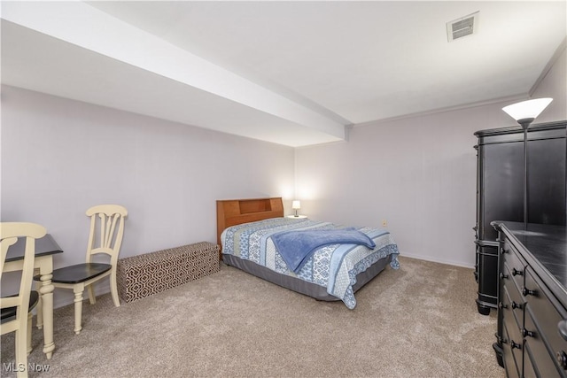 bedroom with visible vents and light colored carpet