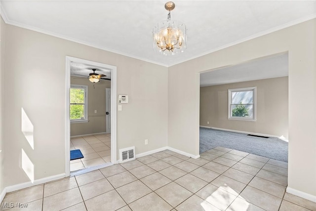 unfurnished room featuring visible vents, baseboards, and light tile patterned floors
