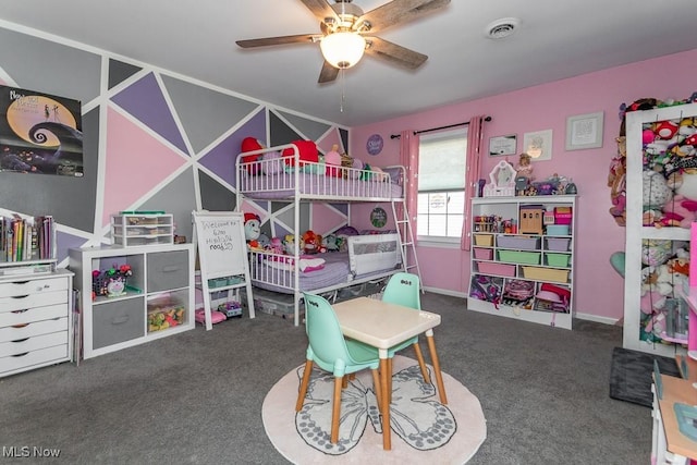 carpeted bedroom featuring visible vents