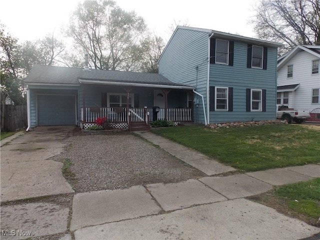 view of front facade featuring an attached garage, concrete driveway, a porch, and a front yard