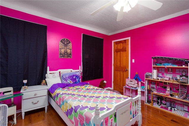 326 N Lyman St, Wadsworth, OH 44281 - bedroom with ornamental molding, a ceiling fan, and wood finished floors
