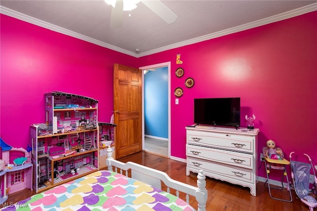 326 N Lyman St, Wadsworth, OH 44281 - bedroom with ornamental molding, baseboards, a ceiling fan, and wood finished floors