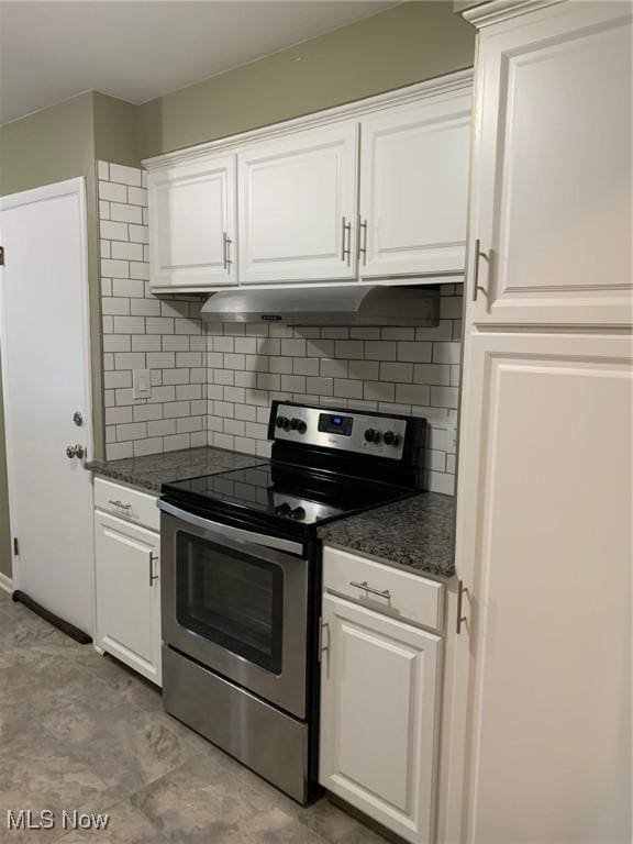 kitchen featuring under cabinet range hood, stainless steel range with electric cooktop, white cabinetry, and backsplash
