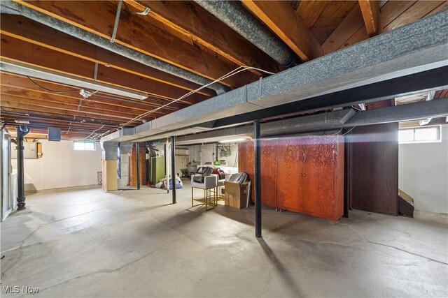 basement featuring heating unit