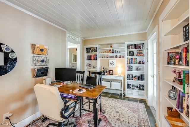 office with built in features, ornamental molding, and tile patterned floors