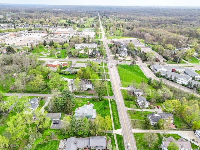aerial view with a residential view and a wooded view