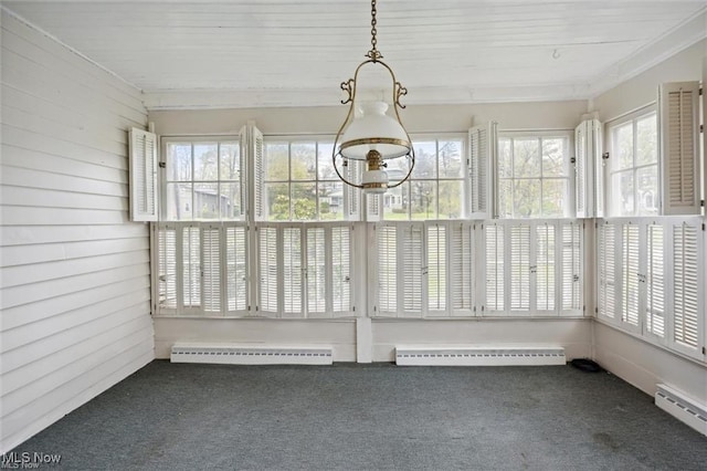 unfurnished sunroom with carpet, baseboard heating, and a healthy amount of sunlight