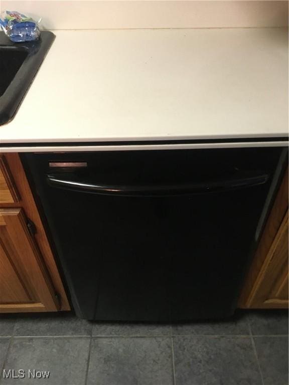 interior details with a sink and dishwasher