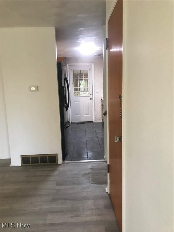 hall featuring visible vents