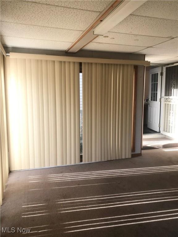 interior space with a drop ceiling