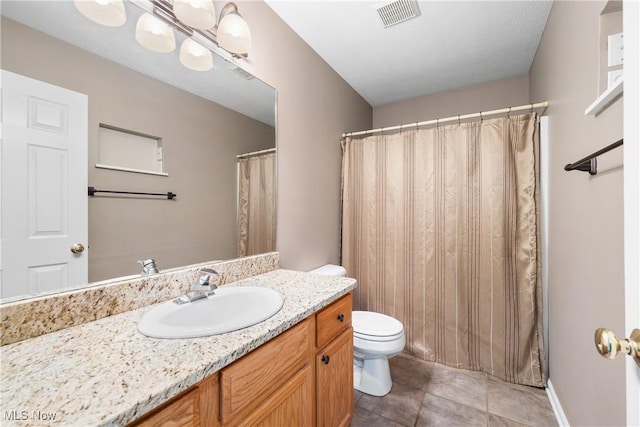 full bath with visible vents, toilet, and vanity