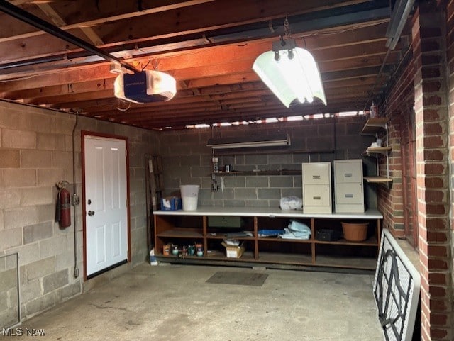 interior space featuring concrete block wall