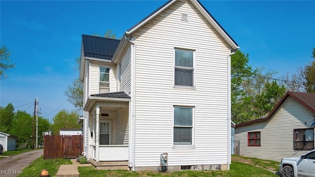 view of front of house with metal roof