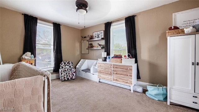 bedroom with carpet floors and ceiling fan