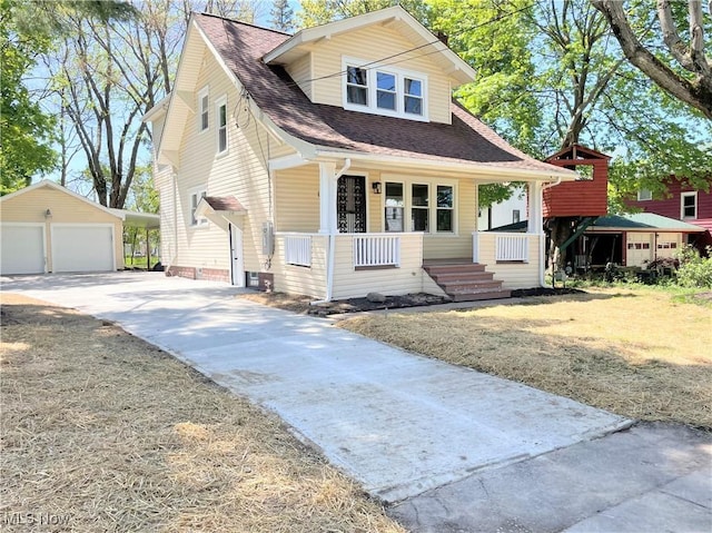 bungalow-style home featuring a garage, an outdoor structure, a porch, and roof with shingles