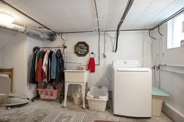 below grade area featuring washer / dryer