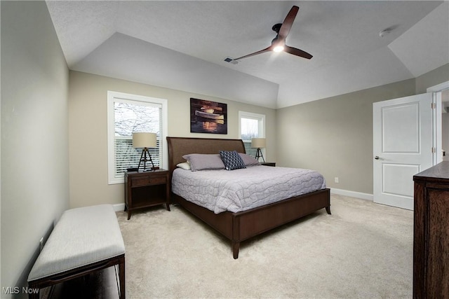 2716 Rocky Ridge Dr, Westlake, OH 44145 - bedroom featuring lofted ceiling, light colored carpet, visible vents, a ceiling fan, and baseboards
