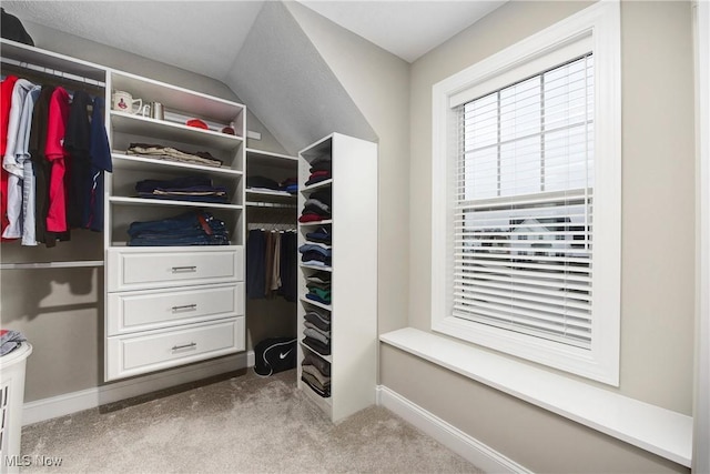 2716 Rocky Ridge Dr, Westlake, OH 44145 - walk in closet with lofted ceiling and carpet floors