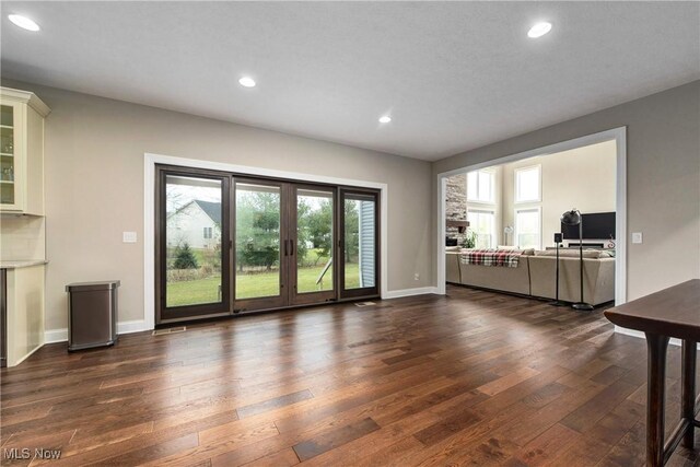 2716 Rocky Ridge Dr, Westlake, OH 44145 - living area with dark wood-style flooring, baseboards, and recessed lighting