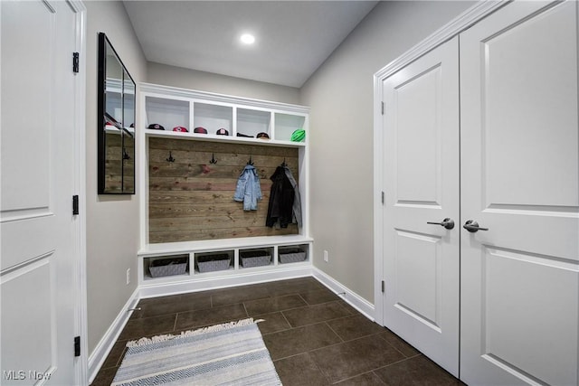 2716 Rocky Ridge Dr, Westlake, OH 44145 - mudroom featuring dark tile patterned flooring and baseboards