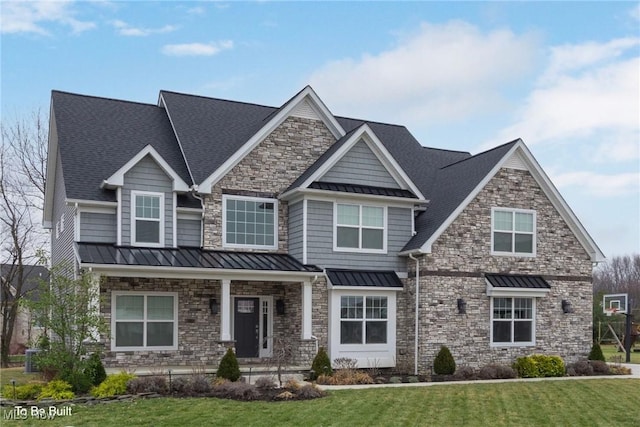 2716 Rocky Ridge Dr, Westlake, OH 44145 - craftsman-style home featuring covered porch, a shingled roof, a standing seam roof, and a front yard