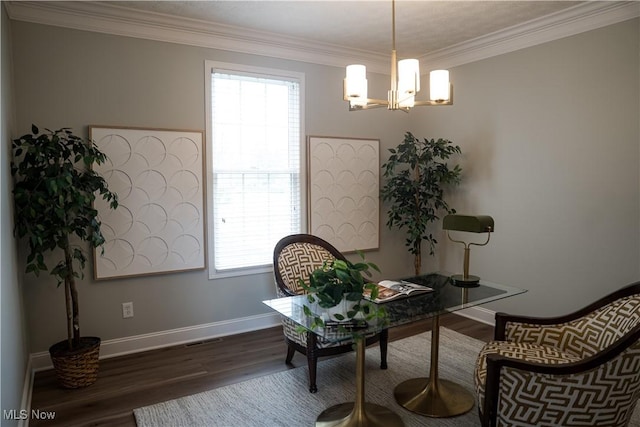 interior space with visible vents, crown molding, wood finished floors, baseboards, and an inviting chandelier