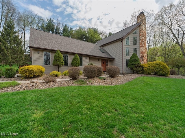 view of property exterior featuring a shingled roof, a chimney, and a yard