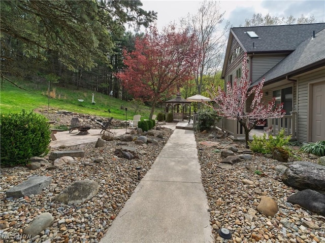 view of yard with a gazebo and a patio area