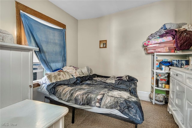 bedroom featuring carpet