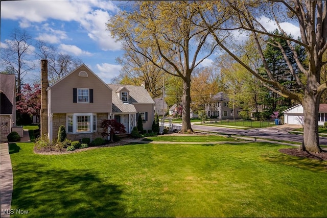 view of yard featuring a detached garage