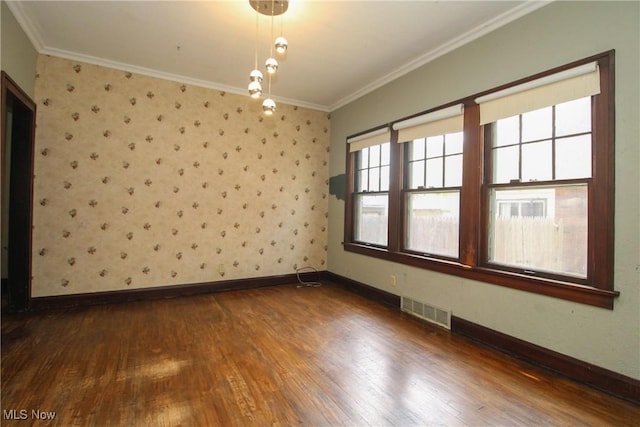 132 Jennette Dr, Boardman, OH 44512 - unfurnished room featuring ornamental molding, dark wood-type flooring, and visible vents