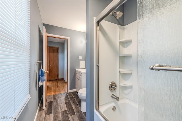 full bath with toilet, baseboards, combined bath / shower with glass door, and wood finished floors