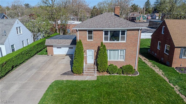 traditional home with brick siding, a garage, a chimney, and concrete driveway