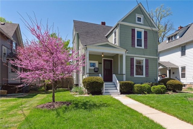 162 S Cedar St, Oberlin, OH 44074 - view of front of house with a front lawn and covered porch