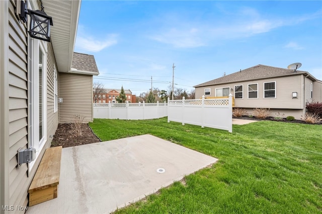view of yard with fence and a patio area