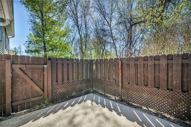 exterior space with fence and a gate