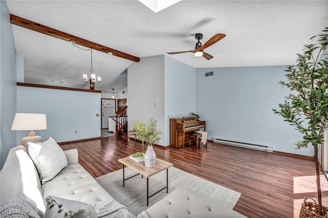 living room featuring vaulted ceiling with skylight, visible vents, wood finished floors, a baseboard radiator, and ceiling fan with notable chandelier