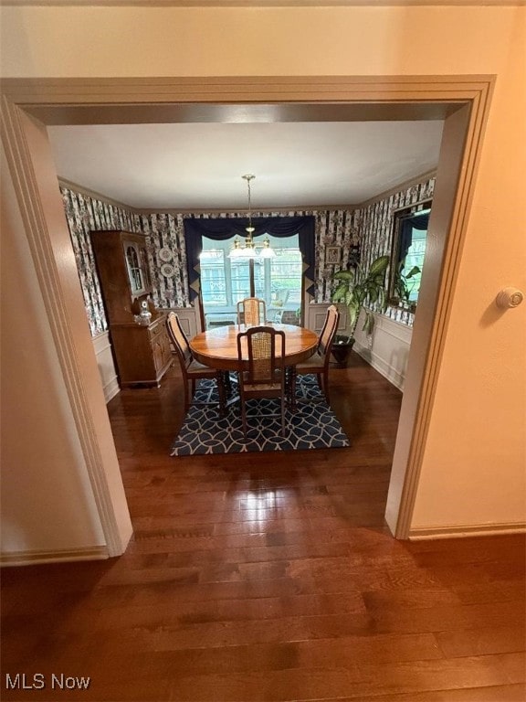 422 Glenwoods Ct, Boardman, OH 44512 - dining space featuring wallpapered walls, dark wood finished floors, baseboards, and a chandelier