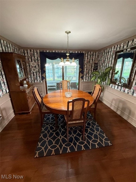 422 Glenwoods Ct, Boardman, OH 44512 - dining area with wallpapered walls, dark wood-style floors, a wainscoted wall, a decorative wall, and a chandelier