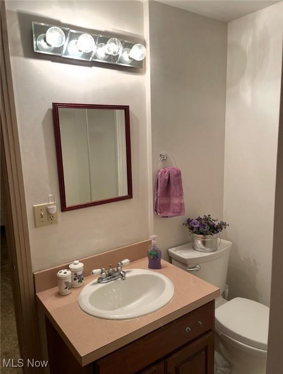 422 Glenwoods Ct, Boardman, OH 44512 - half bathroom with vanity and toilet