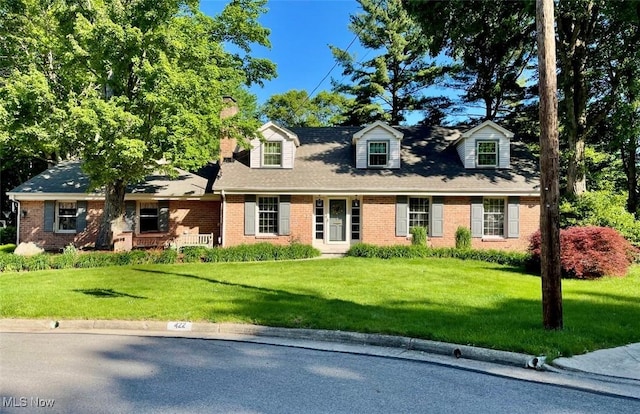 422 Glenwoods Ct, Boardman, OH 44512 - new england style home with brick siding and a front lawn