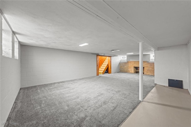 basement featuring stairs