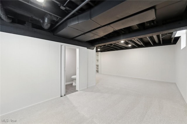 finished below grade area featuring carpet flooring