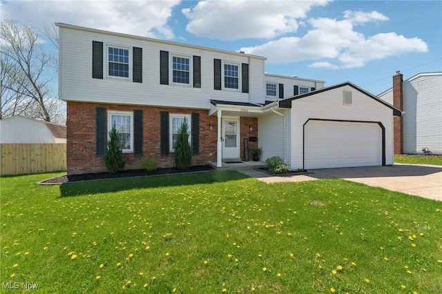 colonial house featuring a front yard, brick siding, fence, concrete driveway, and an attached garage